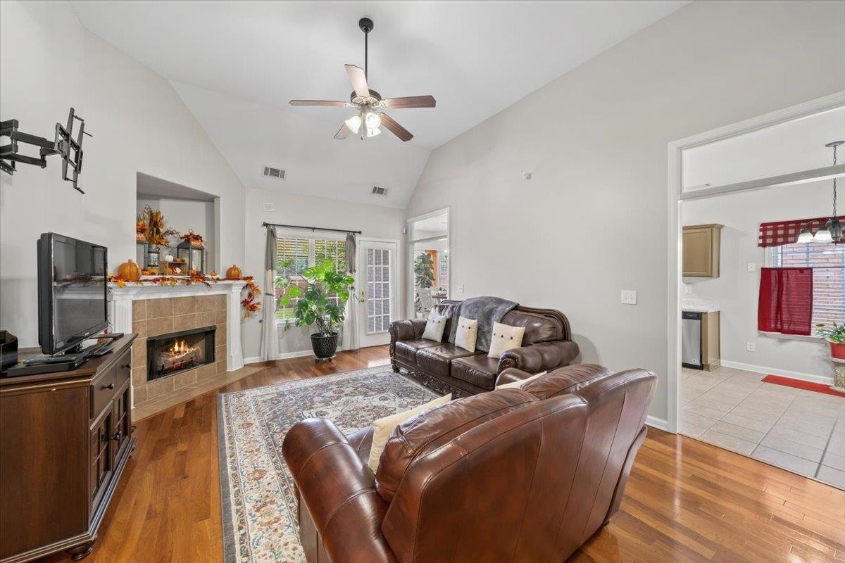 10470 Ashfarm Way Collierville, TN 38017 - Photo 3 of 15 a living room with furniture and a fireplace