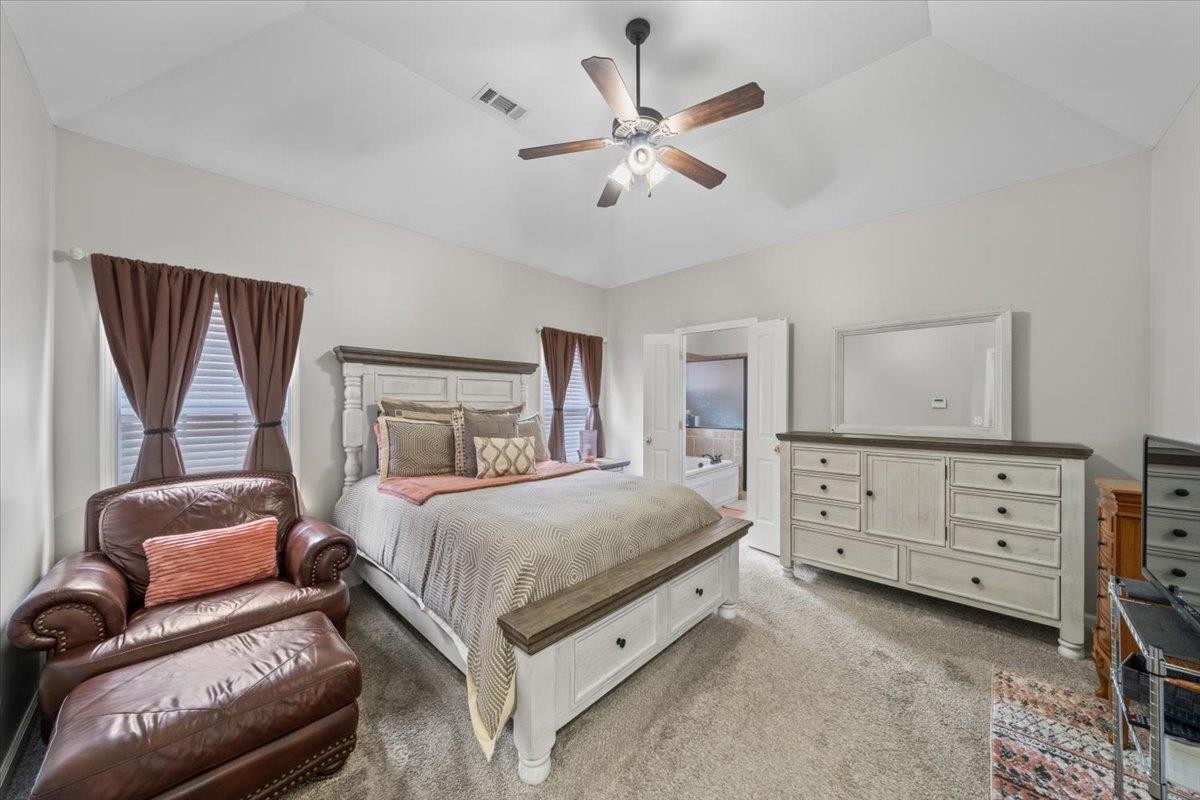 10470 Ashfarm Way Collierville, TN 38017 - Photo 8 of 15 a bedroom with a bed and a couch