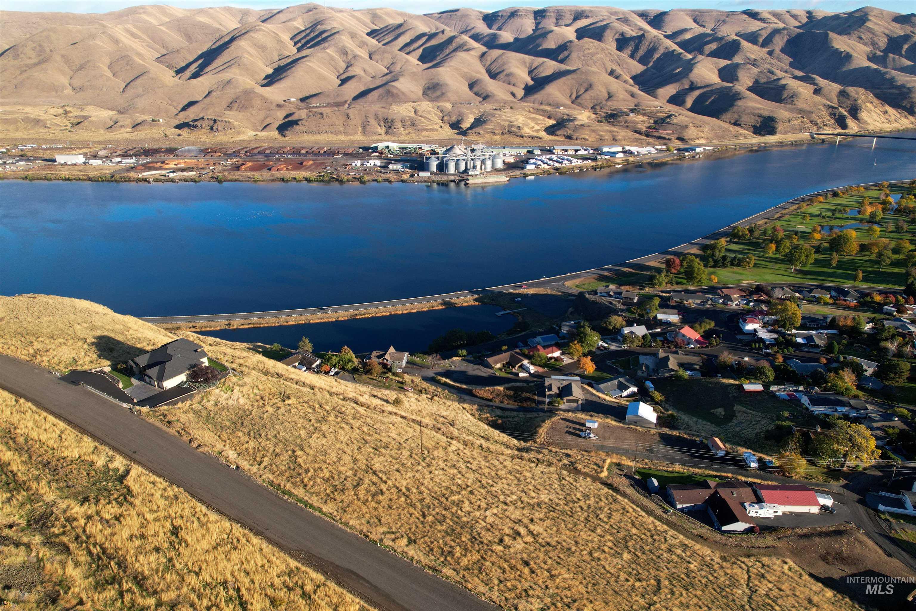 2600 Valleyview Drive Clarkston, WA 99403 - Photo 3 of 13 Water view with a mountain backdrop and nearby suburban area
