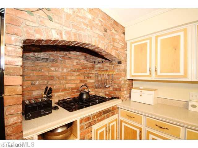 227 Chateau Road Durham, NC 27704 - Photo 6 of 16 Kitchen. Brick Stove