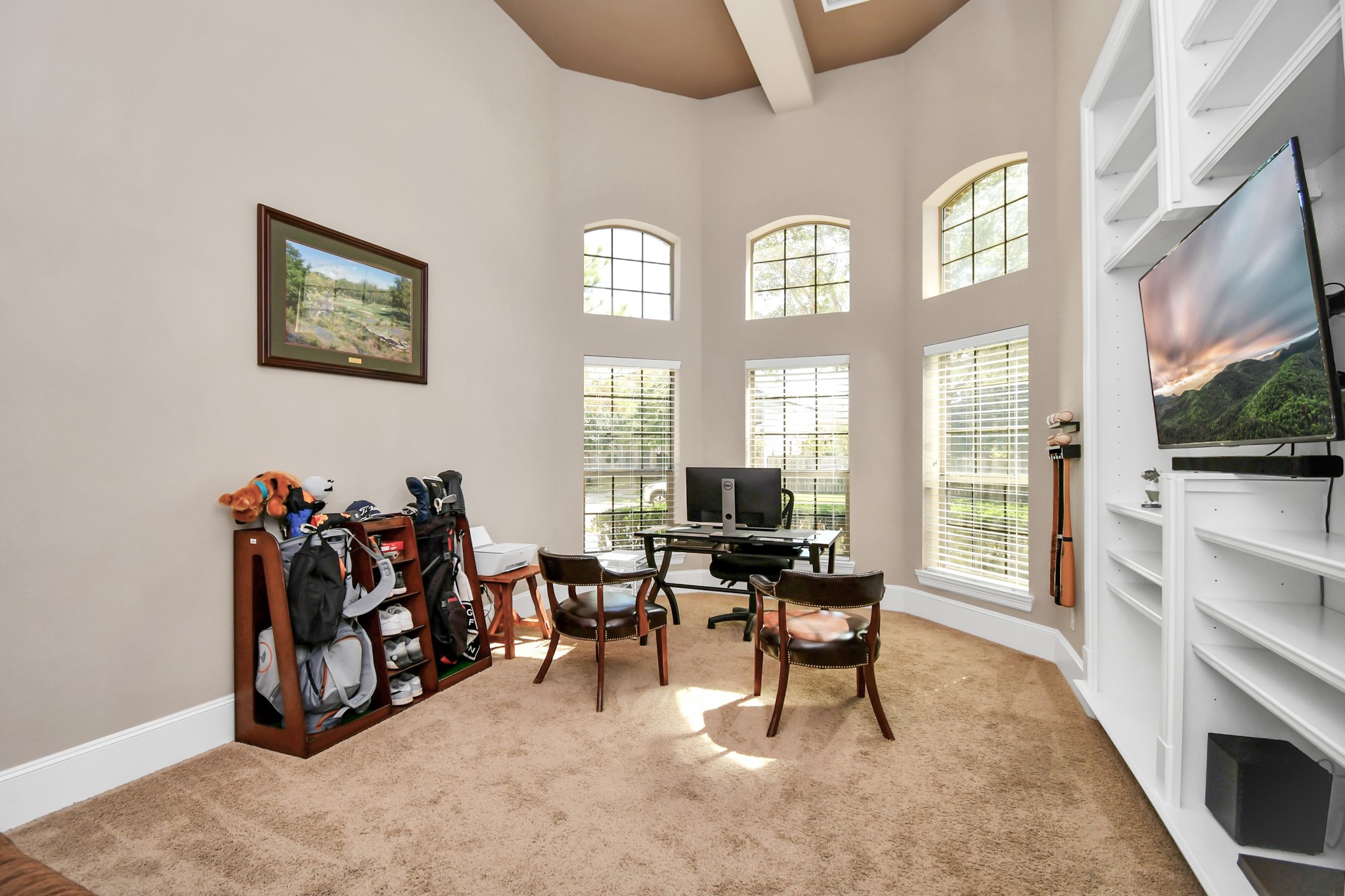 27118 Cardiff Rocks Drive Katy, TX 77494 - Photo 13 of 50 a view of a livingroom with workspace and a window