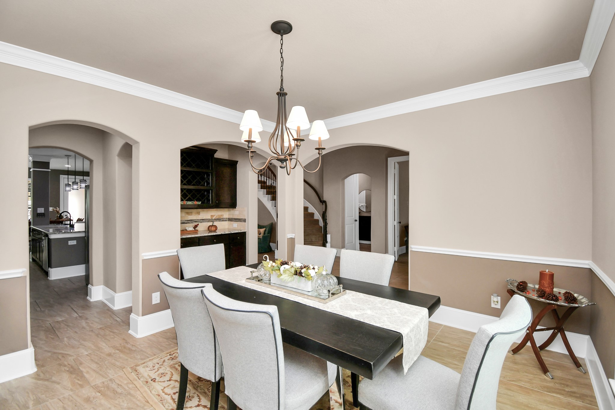 27118 Cardiff Rocks Drive Katy, TX 77494 - Photo 14 of 50 a view of a dining room with furniture and a chandelier