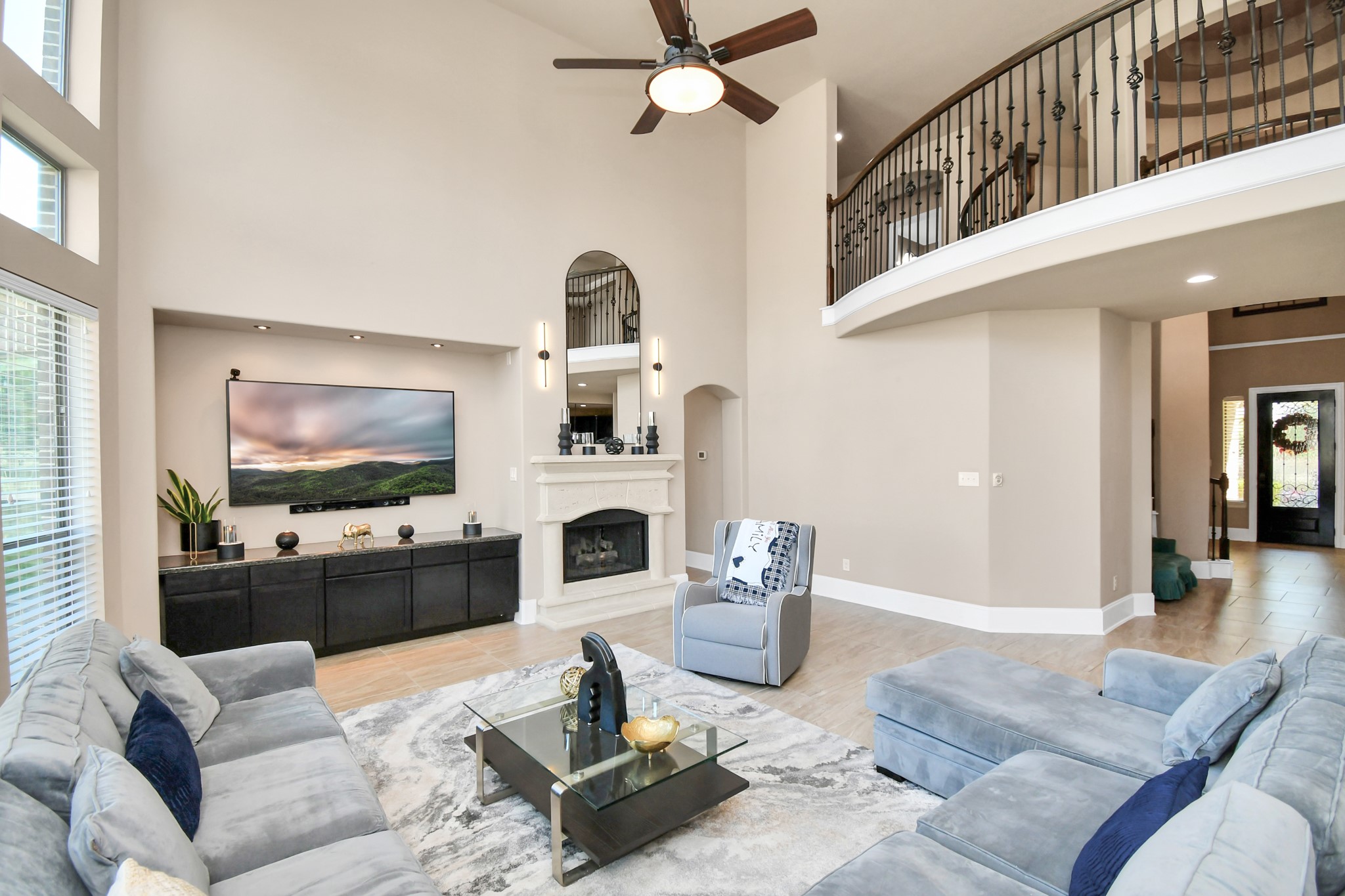 27118 Cardiff Rocks Drive Katy, TX 77494 - Photo 22 of 50 a living room with furniture and a flat screen tv