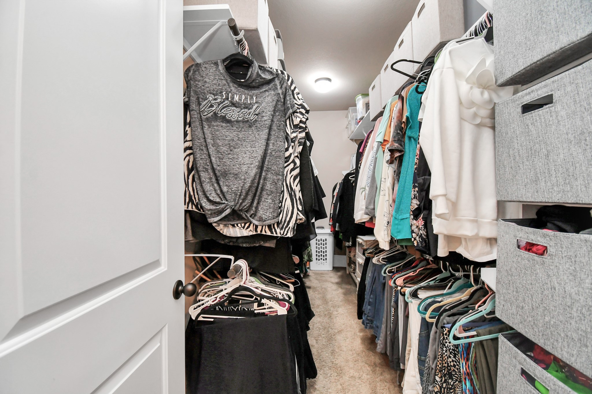27118 Cardiff Rocks Drive Katy, TX 77494 - Photo 30 of 50 a view of walk in closet with clothes and shoes