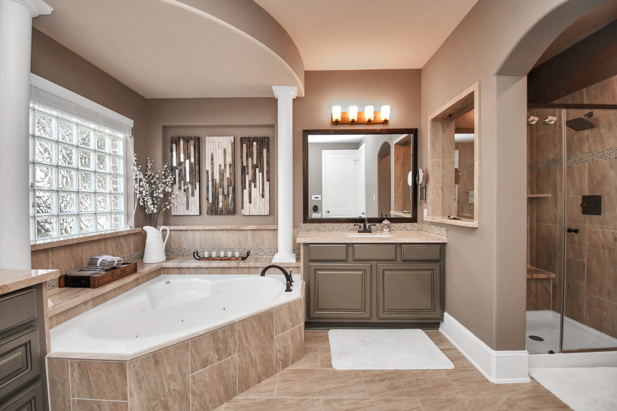 27118 Cardiff Rocks Drive Katy, TX 77494 - Photo 31 of 50 a spacious bathroom with a tub sink and mirror