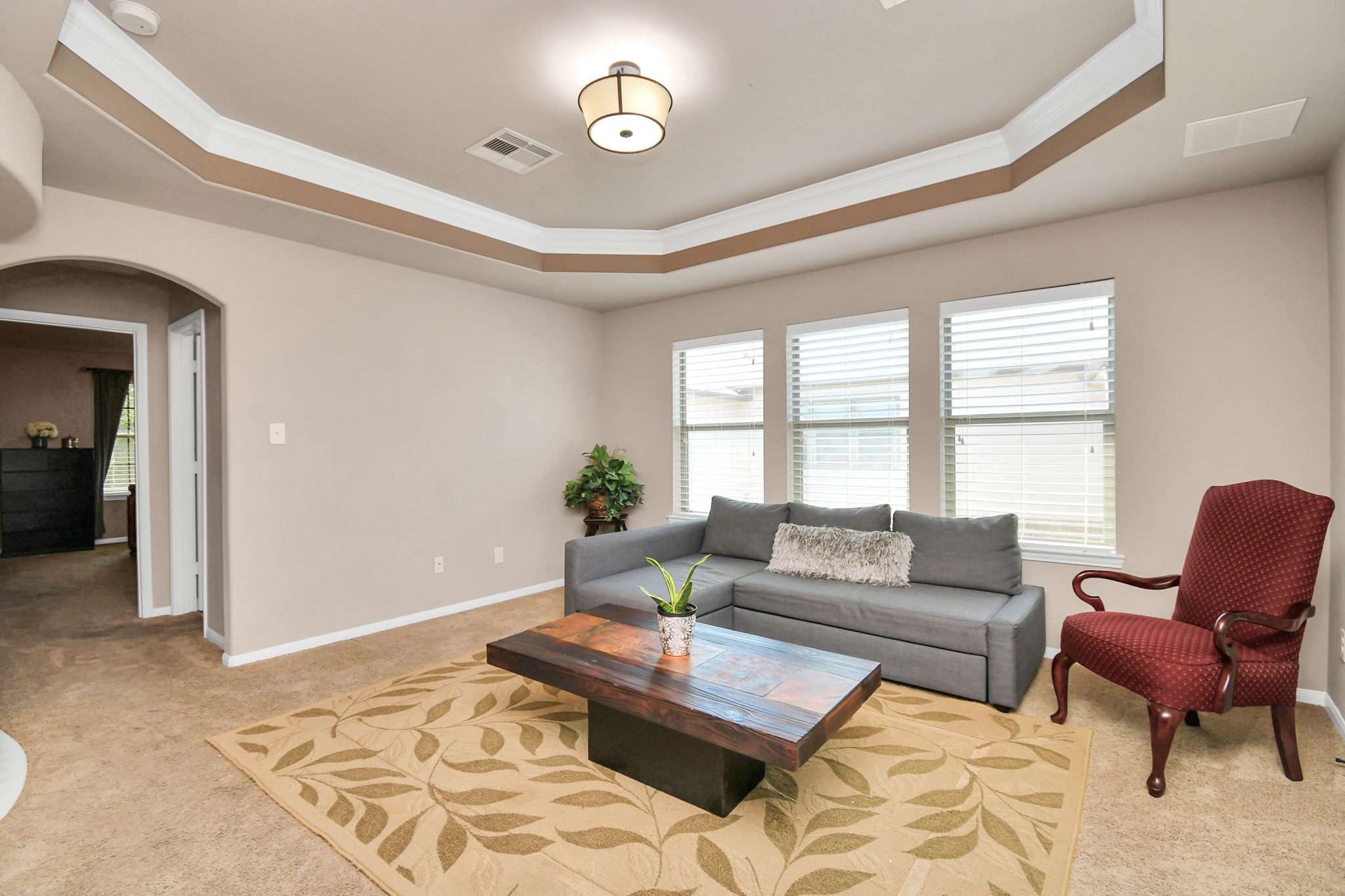 27118 Cardiff Rocks Drive Katy, TX 77494 - Photo 33 of 50 a living room with furniture and a large window