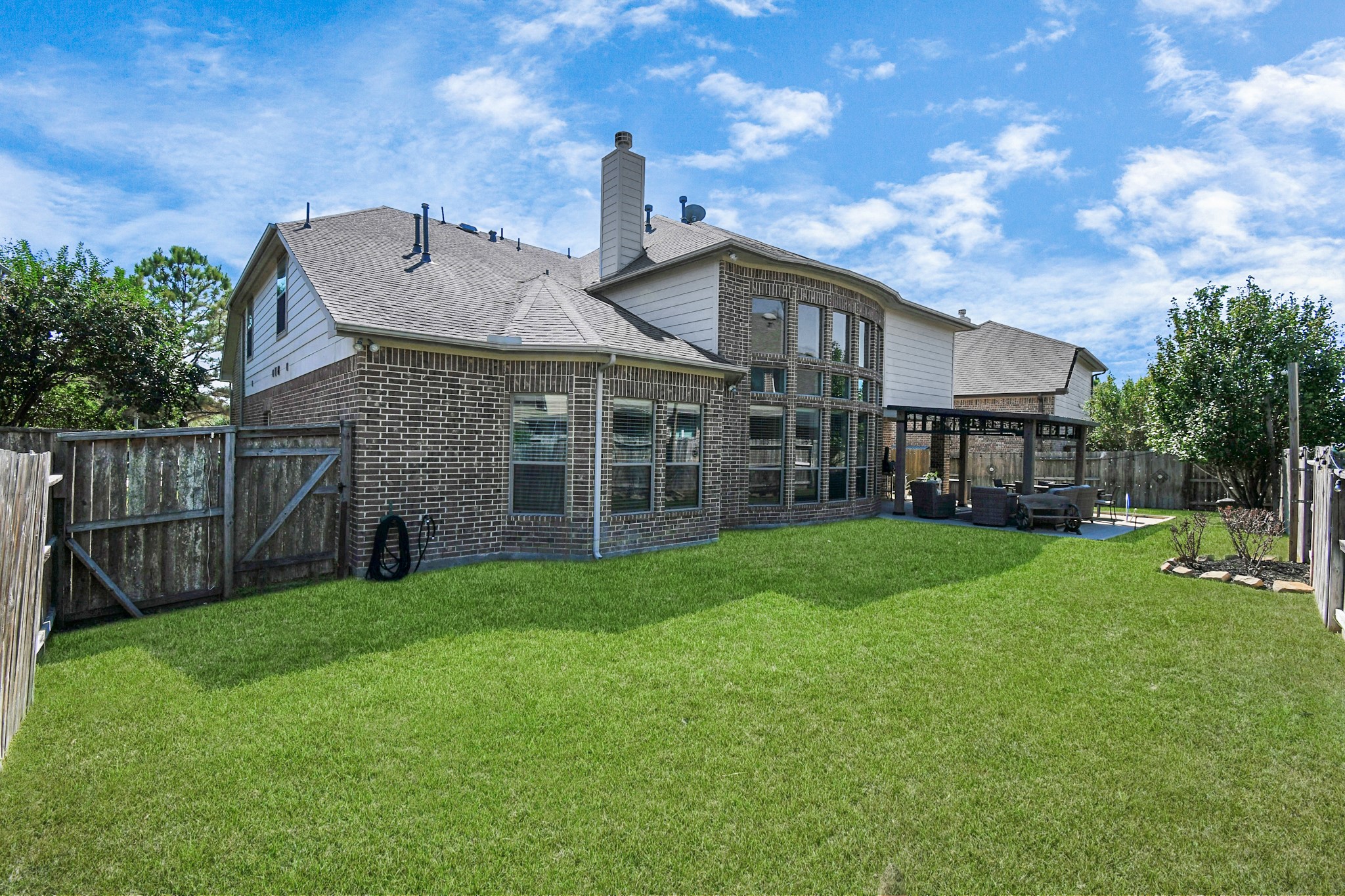 27118 Cardiff Rocks Drive Katy, TX 77494 - Photo 6 of 50 a front view of a house with garden