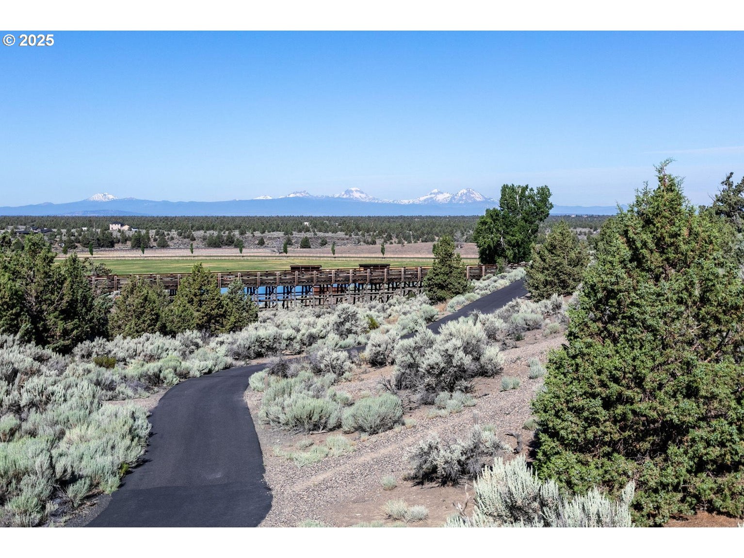 0 Southwest Brasada Rnch Road, Unit 649 Powell Butte, OR 97753 - Photo 17 of 32 a view of a city and mountain view in back