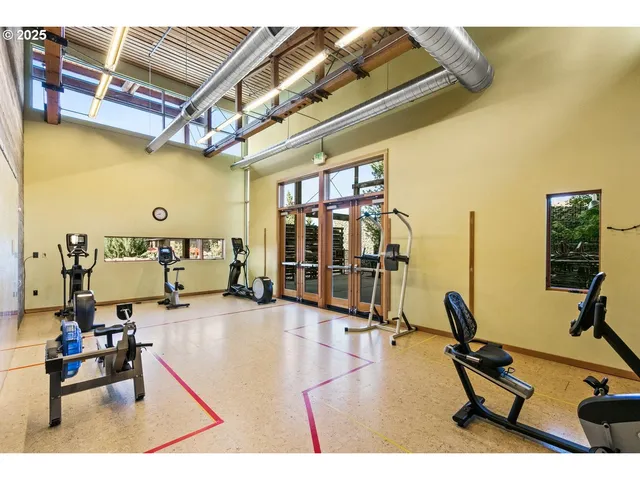 a view of a living room filled with furniture