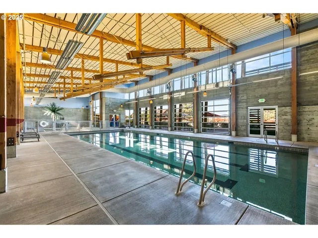 a view of a swimming pool and lake