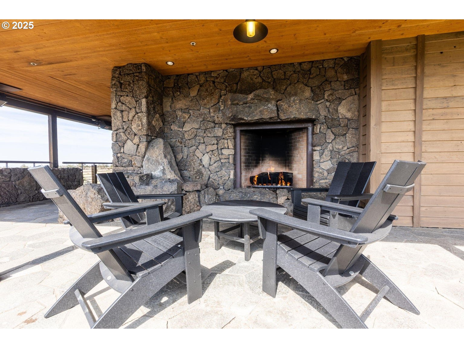 0 Southwest Brasada Rnch Road, Unit 649 Powell Butte, OR 97753 - Photo 27 of 32 a view of a patio with couches and table