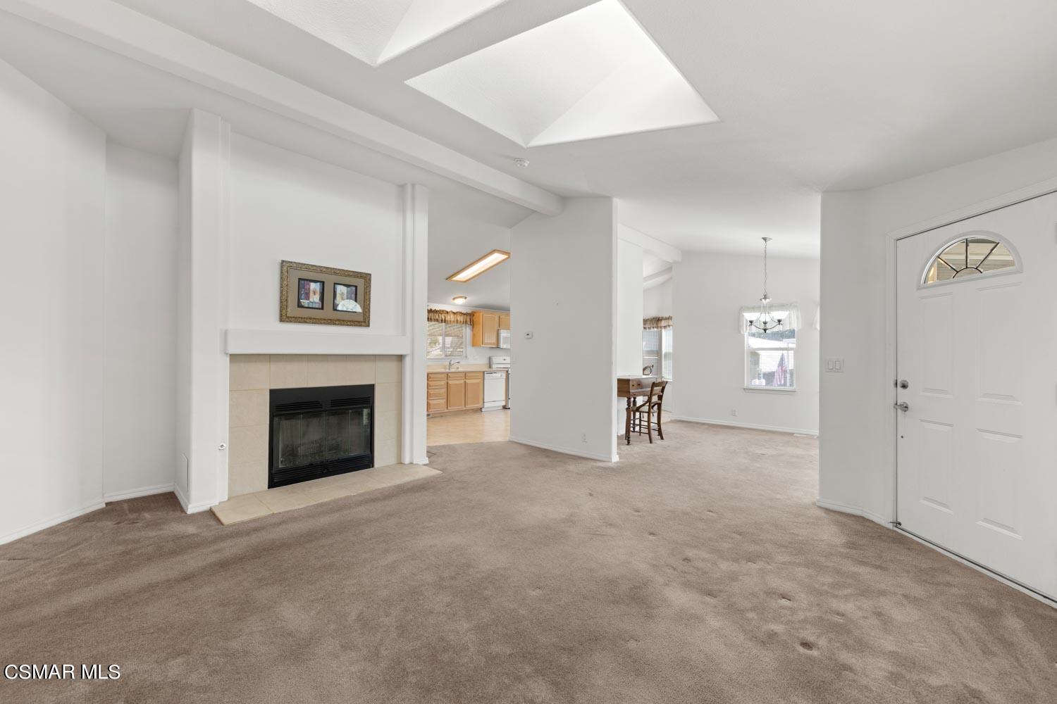 195 Tierra Rejada Road, Unit 155 Simi Valley, CA 93065 - Photo 11 of 33 a view of empty room with a fireplace