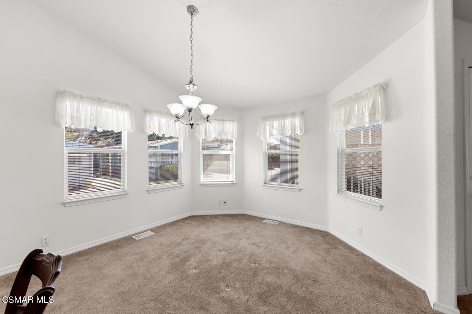 195 Tierra Rejada Road, Unit 155 Simi Valley, CA 93065 - Photo 12 of 33 a view of an empty room with a window