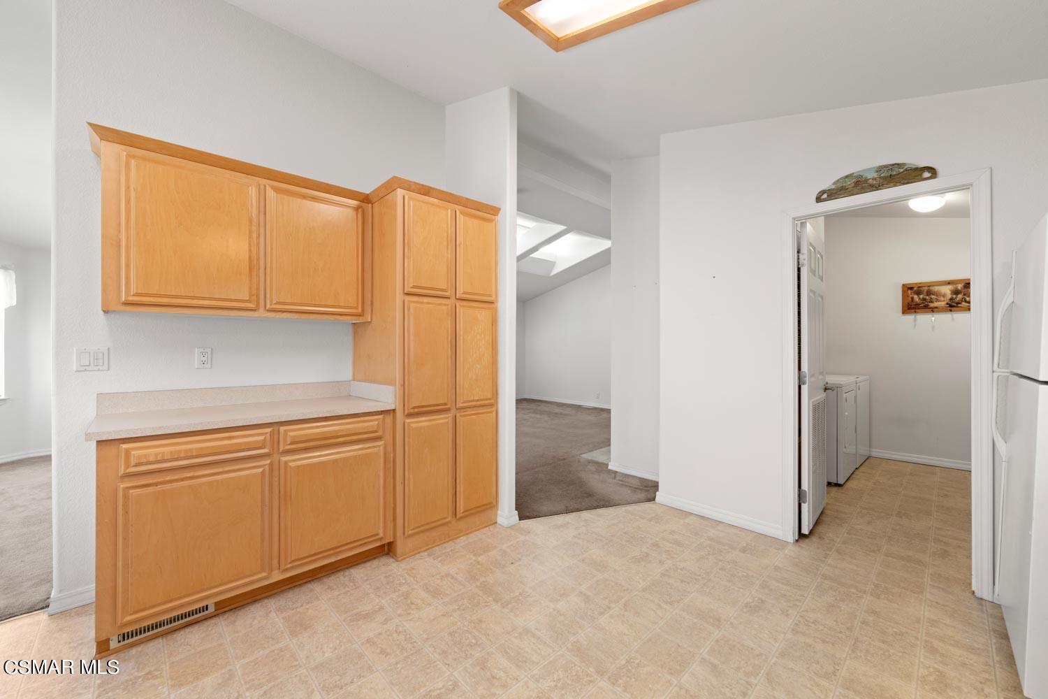 195 Tierra Rejada Road, Unit 155 Simi Valley, CA 93065 - Photo 17 of 33 a view of a storage & utility room with washer and dryer