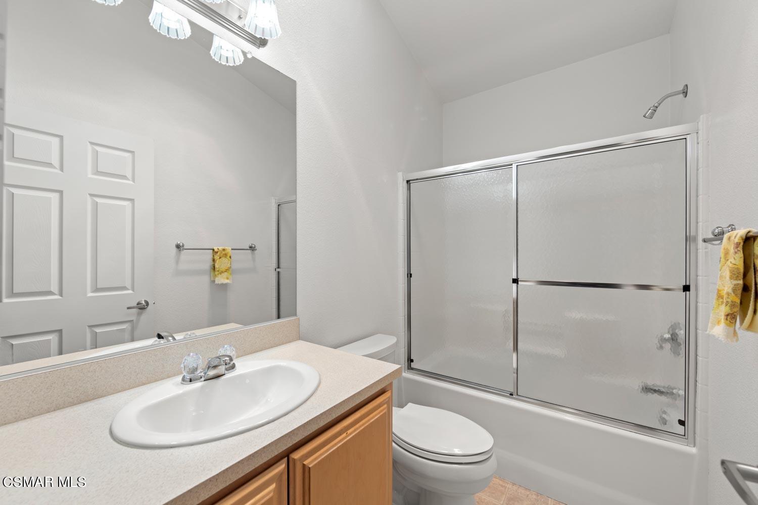 195 Tierra Rejada Road, Unit 155 Simi Valley, CA 93065 - Photo 21 of 33 a bathroom with a sink toilet and shower