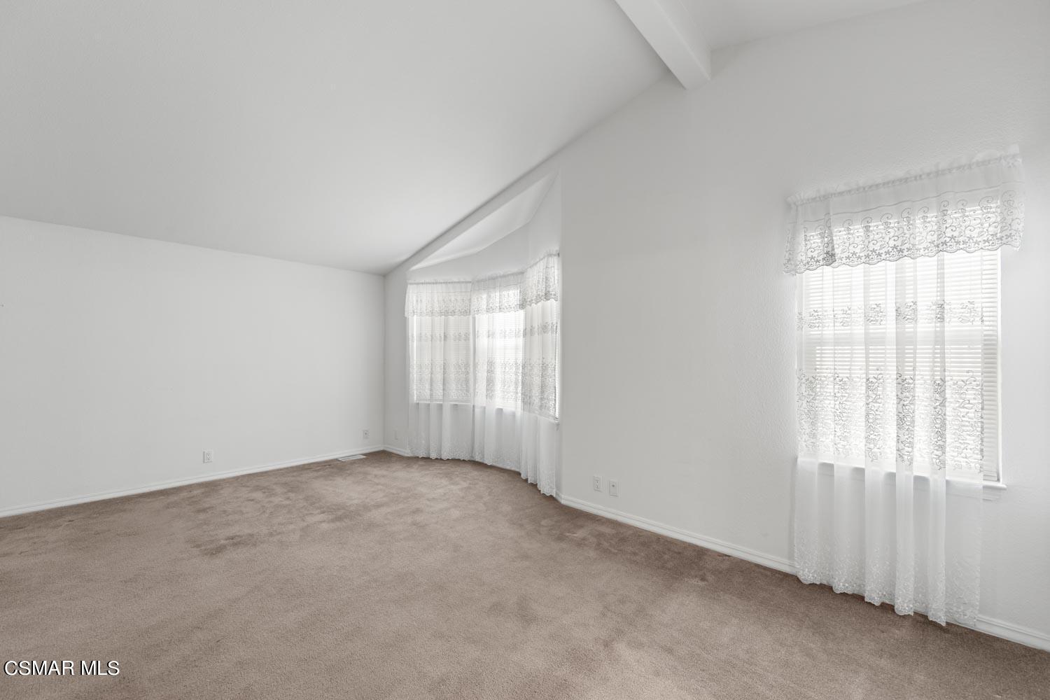 195 Tierra Rejada Road, Unit 155 Simi Valley, CA 93065 - Photo 22 of 33 an empty room with windows