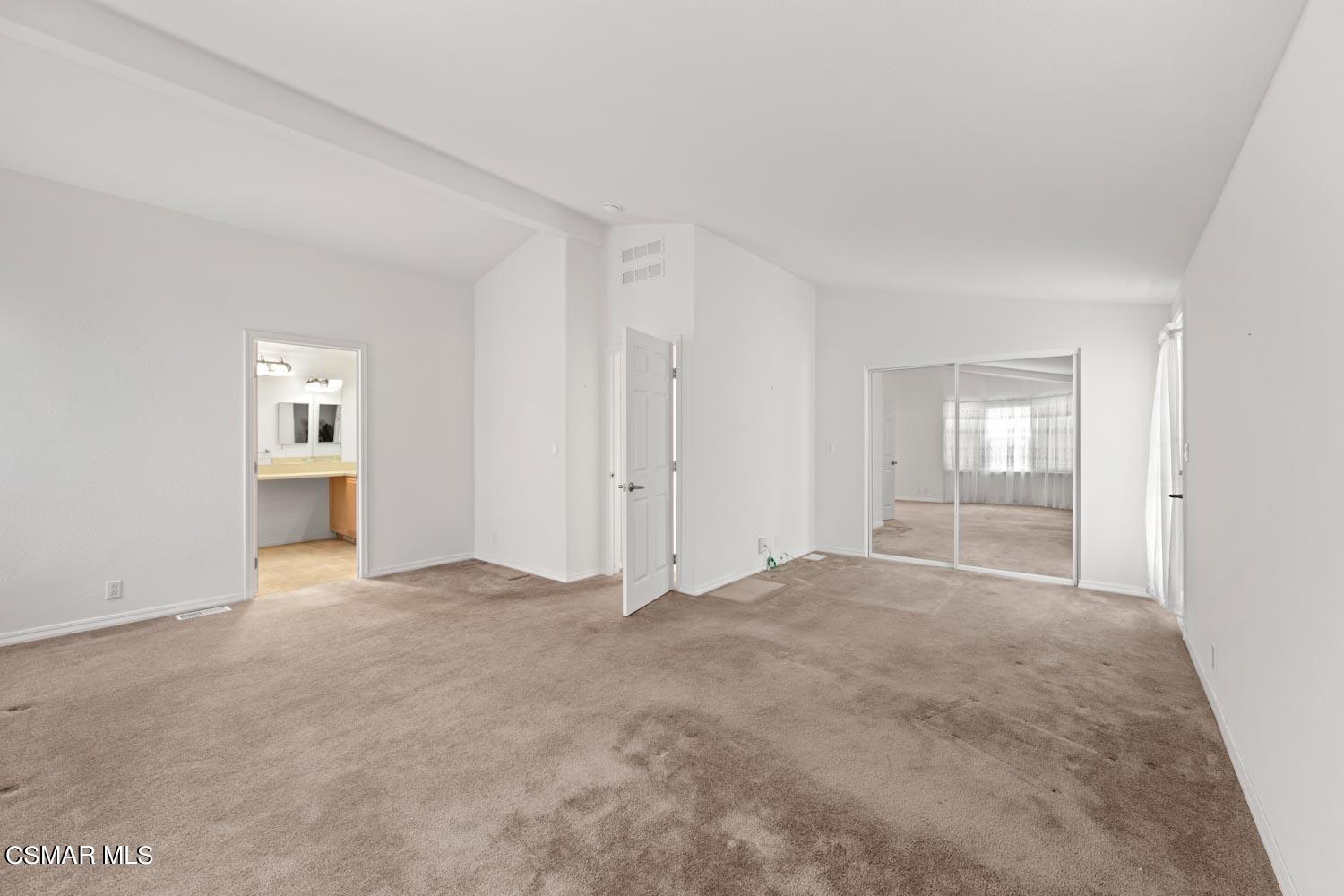 195 Tierra Rejada Road, Unit 155 Simi Valley, CA 93065 - Photo 24 of 33 a view of an empty room with a window
