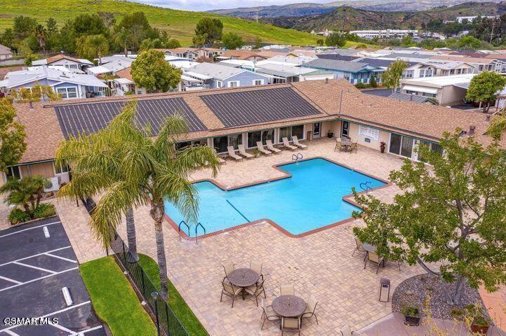 195 Tierra Rejada Road, Unit 155 Simi Valley, CA 93065 - Photo 30 of 33 an aerial view of residential houses with outdoor space and swimming pool