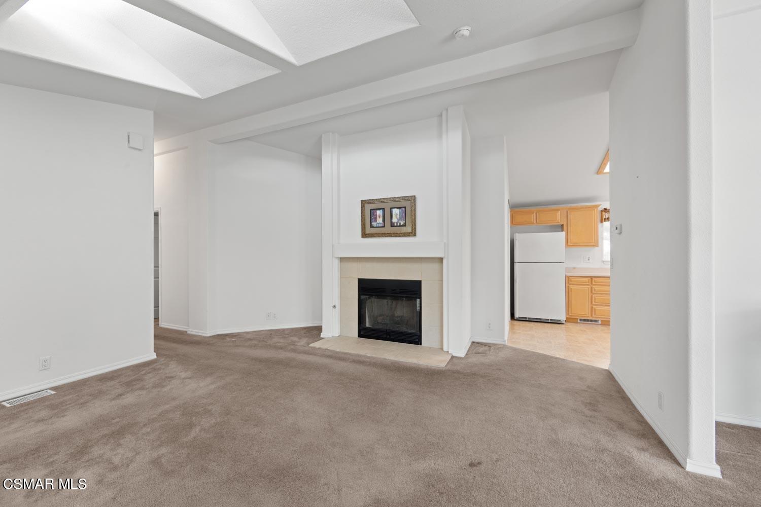 195 Tierra Rejada Road, Unit 155 Simi Valley, CA 93065 - Photo 10 of 33 a view of a livingroom with a fireplace