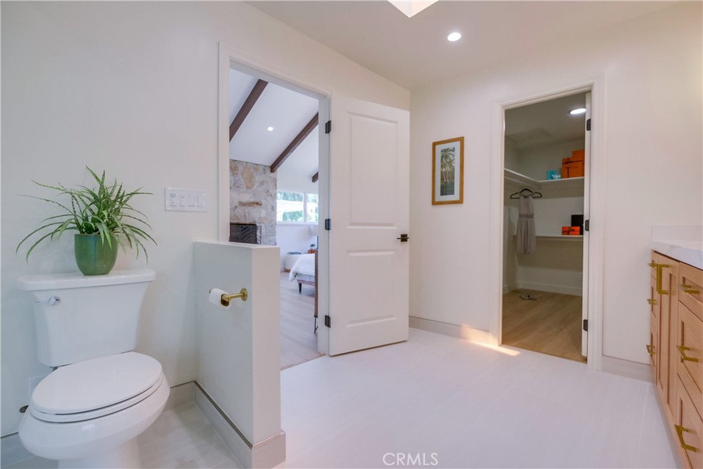 5205 Middlecrest Road Rancho Palos Verdes, CA 90275 - Photo 26 of 63 a bathroom with a toilet a sink and shower