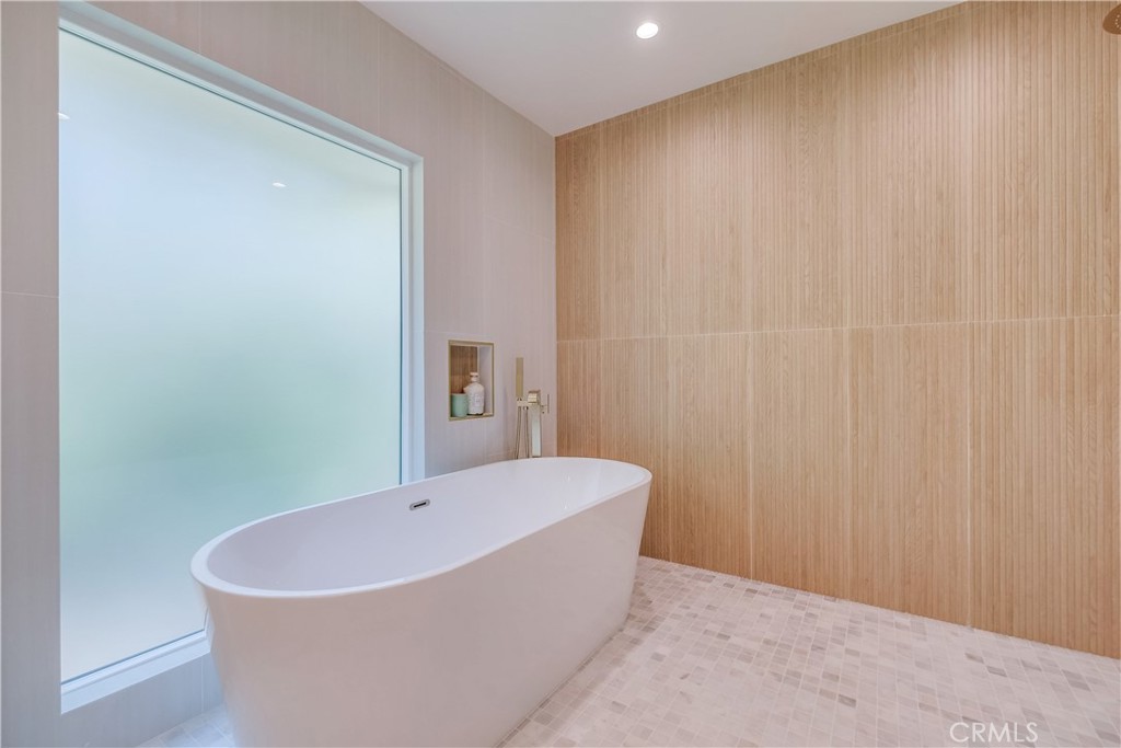 5205 Middlecrest Road Rancho Palos Verdes, CA 90275 - Photo 27 of 63 a white bath tub sitting in a bathroom