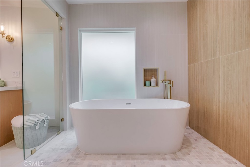 5205 Middlecrest Road Rancho Palos Verdes, CA 90275 - Photo 28 of 63 a white bath tub sitting in a bathroom