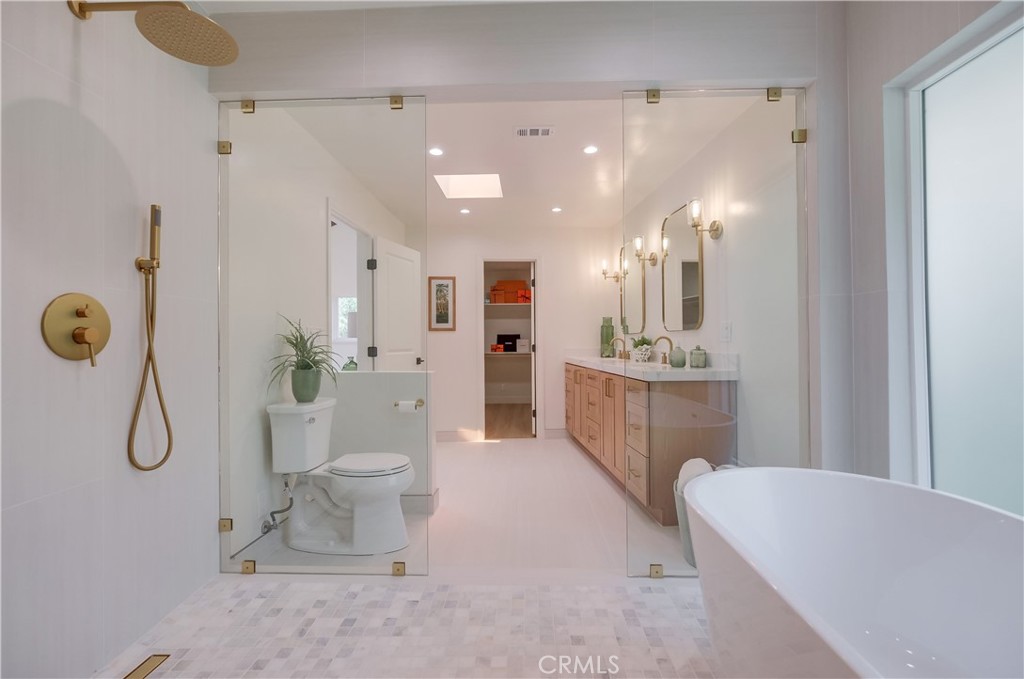 5205 Middlecrest Road Rancho Palos Verdes, CA 90275 - Photo 30 of 63 a bathroom with a sink a toilet and shower
