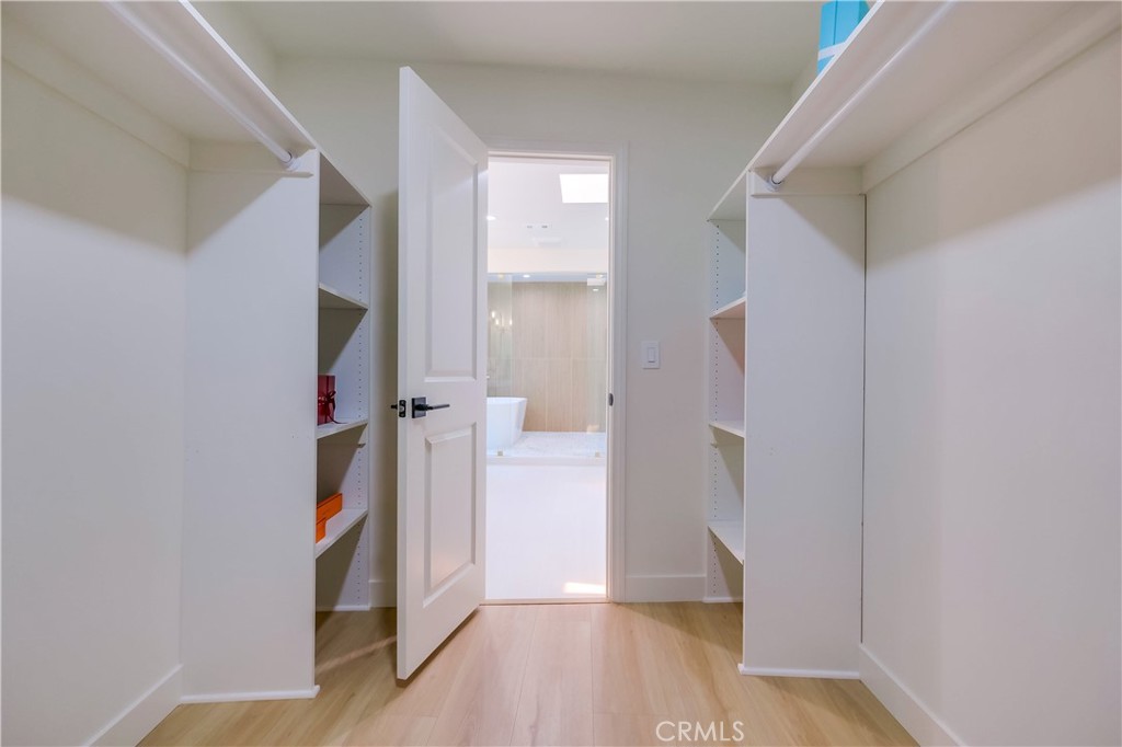 5205 Middlecrest Road Rancho Palos Verdes, CA 90275 - Photo 33 of 63 a view of hallway with wooden floor and staircase
