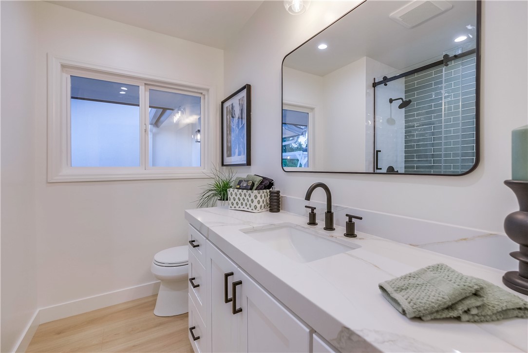 5205 Middlecrest Road Rancho Palos Verdes, CA 90275 - Photo 34 of 63 a bathroom with a sink toilet and mirror