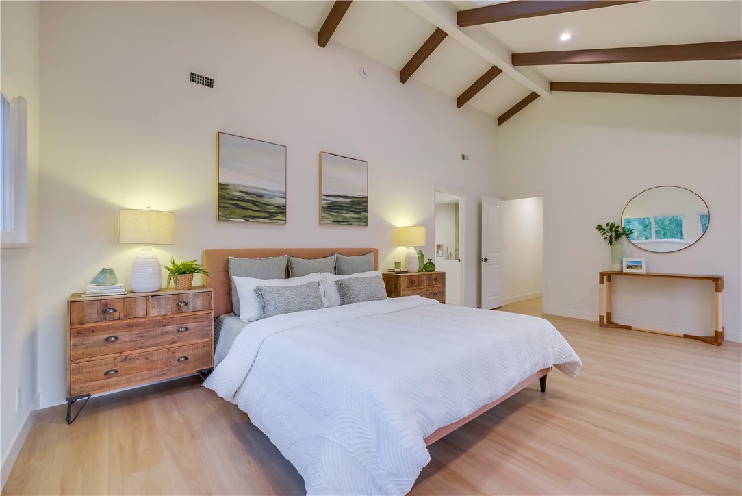 5205 Middlecrest Road Rancho Palos Verdes, CA 90275 - Photo 37 of 63 a bedroom with a bed and ceiling fan