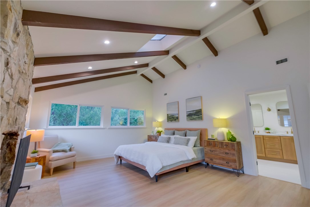 5205 Middlecrest Road Rancho Palos Verdes, CA 90275 - Photo 38 of 63 a bedroom with furniture and a large window