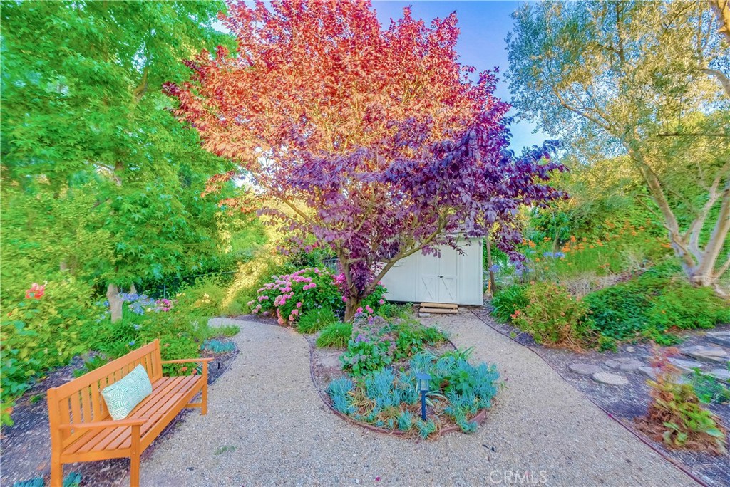 5205 Middlecrest Road Rancho Palos Verdes, CA 90275 - Photo 52 of 63 a backyard of a house with a yard and outdoor seating