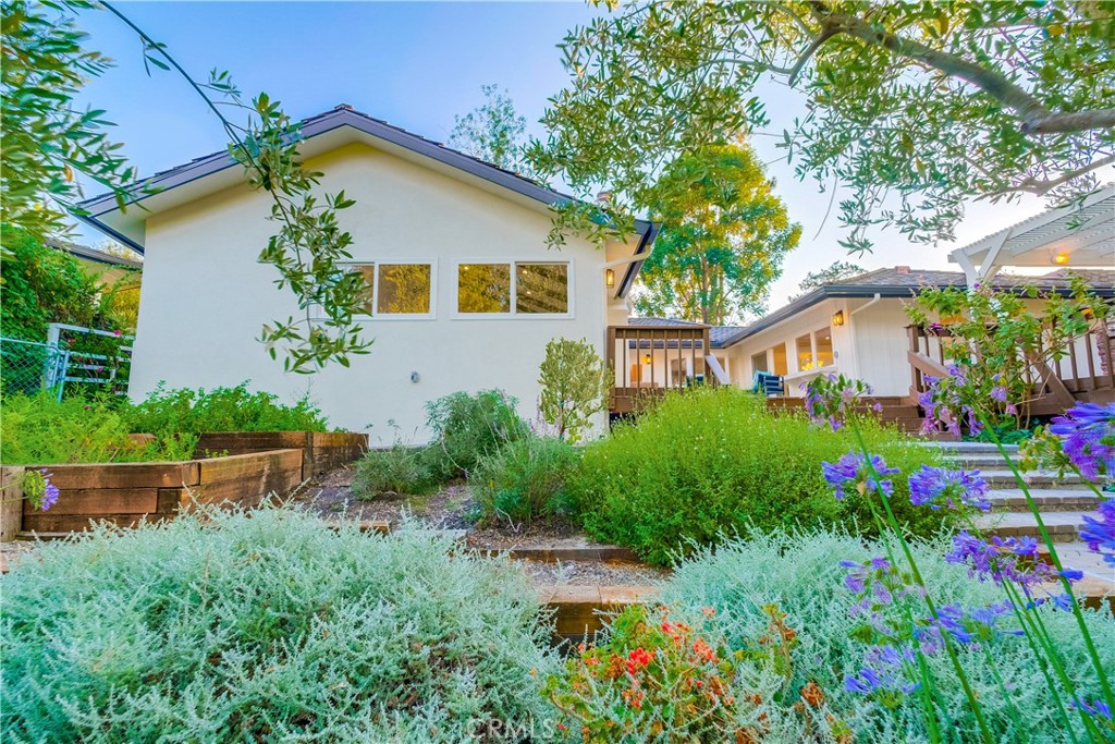 5205 Middlecrest Road Rancho Palos Verdes, CA 90275 - Photo 55 of 63 a front view of house with garden and trees