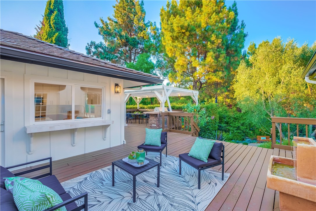 5205 Middlecrest Road Rancho Palos Verdes, CA 90275 - Photo 9 of 63 a view of a chair and tables in the balcony