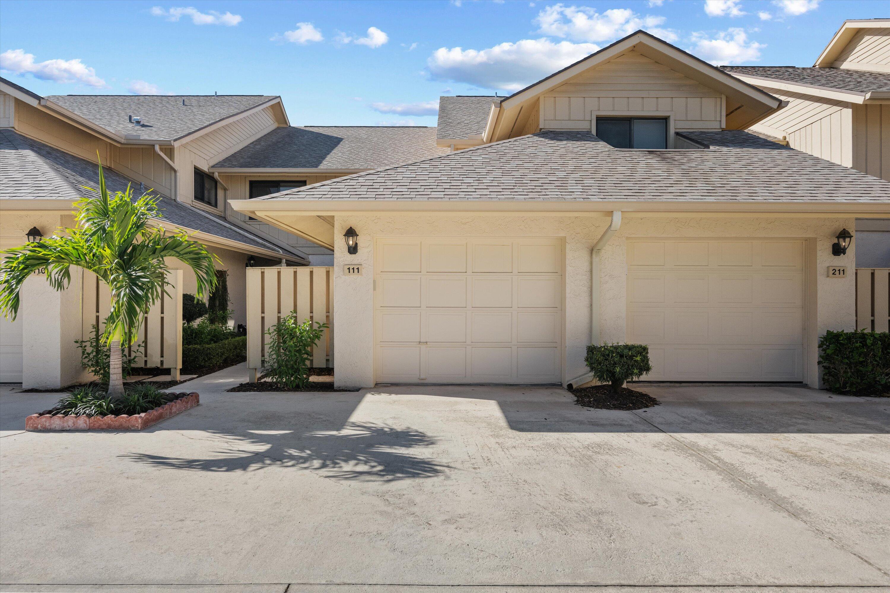 17166 Waterbend Drive, Unit 111 Jupiter, FL 33477 - Photo 2 of 34 a view of a house with a patio