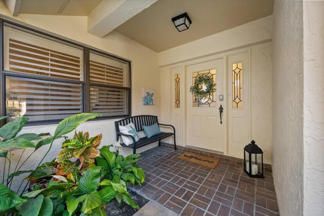 a view of porch with a chairs in workspace