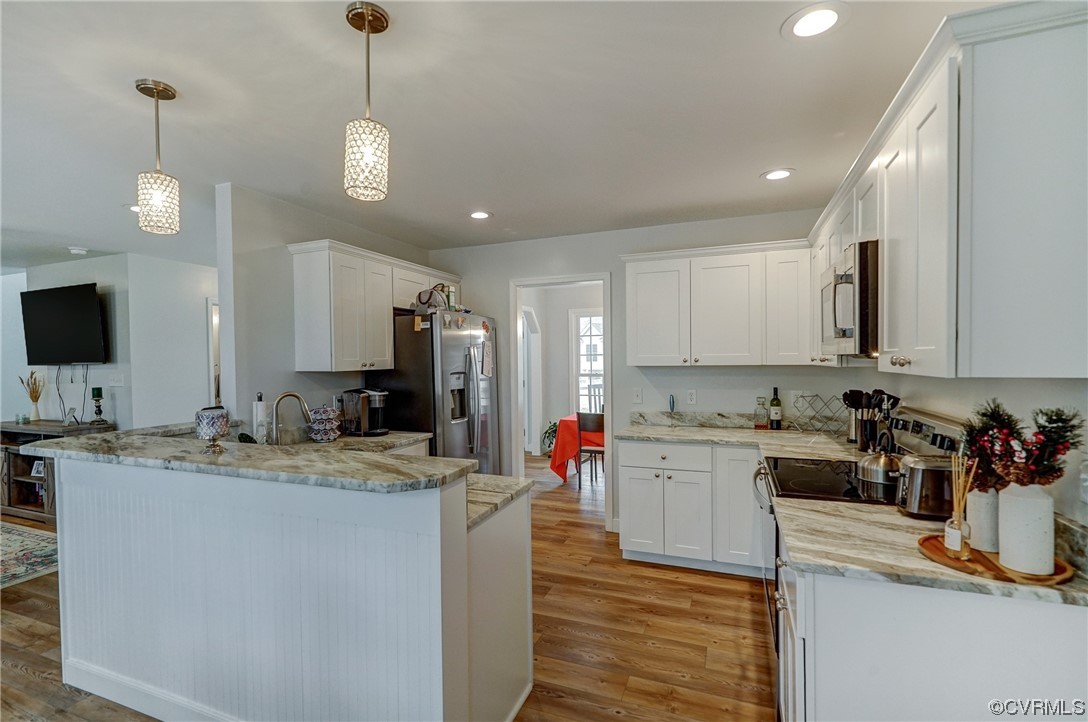 3334 Three Chopt Road Gum Spring, VA 23065 - Photo 12 of 44 a kitchen with a sink stove and cabinets
