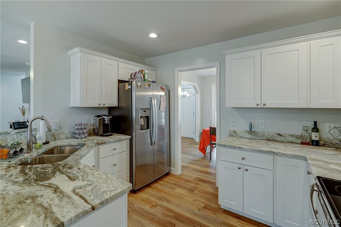 3334 Three Chopt Road Gum Spring, VA 23065 - Photo 13 of 44 a kitchen with stainless steel appliances granite countertop a sink stove and refrigerator