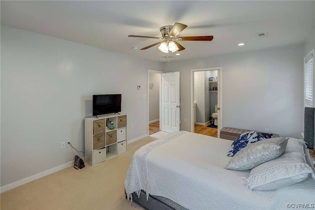 3334 Three Chopt Road Gum Spring, VA 23065 - Photo 30 of 44 a bedroom with a bed and a flat screen tv