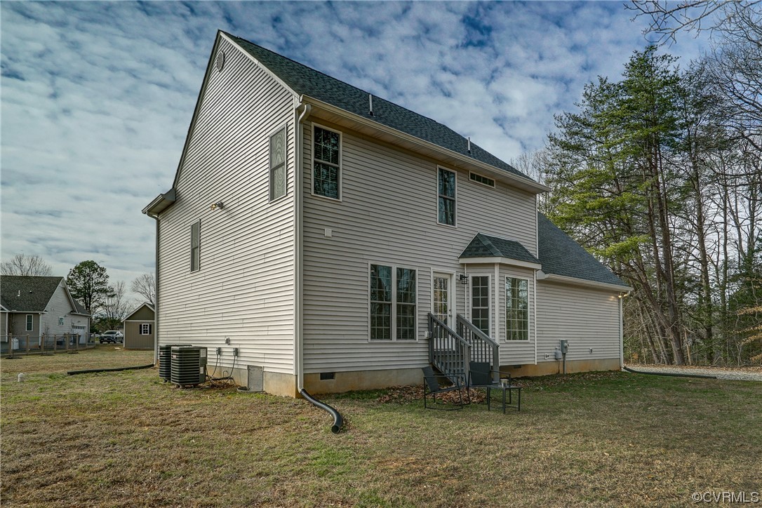 3334 Three Chopt Road Gum Spring, VA 23065 - Photo 36 of 44 a view of a house with a yard