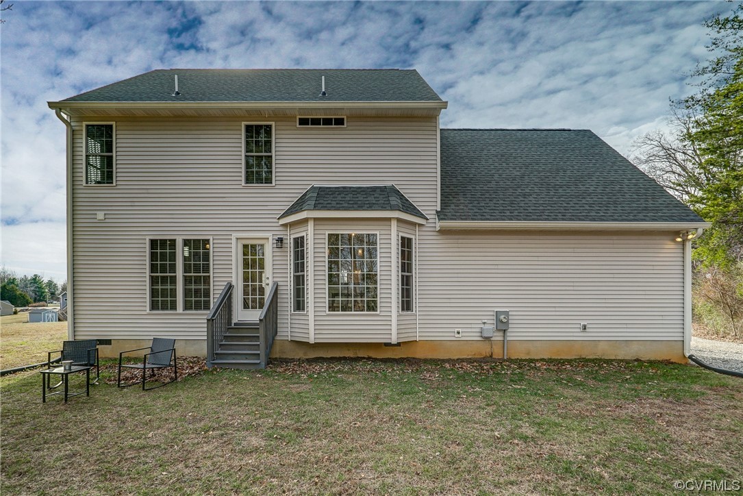 3334 Three Chopt Road Gum Spring, VA 23065 - Photo 37 of 44 front view of a house with a yard