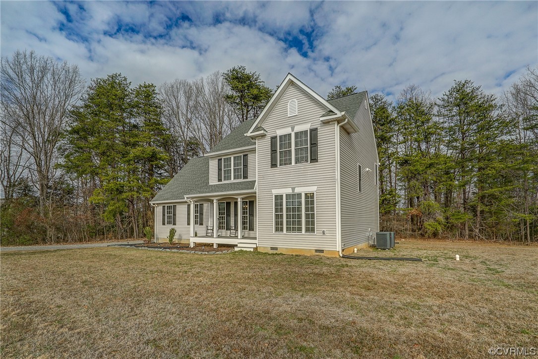 3334 Three Chopt Road Gum Spring, VA 23065 - Photo 43 of 44 a front view of a house with a yard