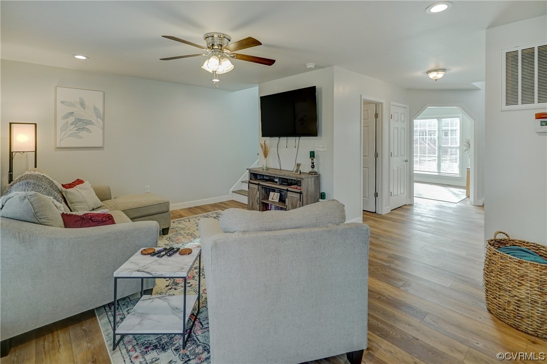 3334 Three Chopt Road Gum Spring, VA 23065 - Photo 8 of 44 a living room with furniture and a flat screen tv