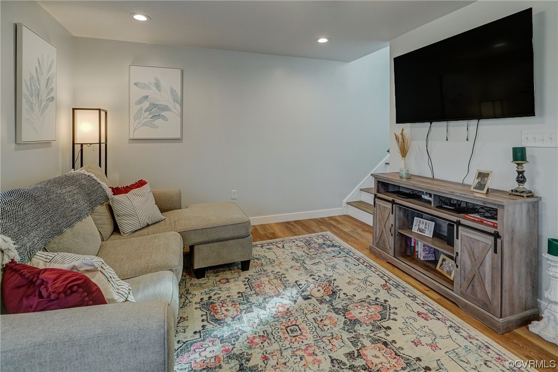 3334 Three Chopt Road Gum Spring, VA 23065 - Photo 9 of 44 a living room with furniture and a flat screen tv
