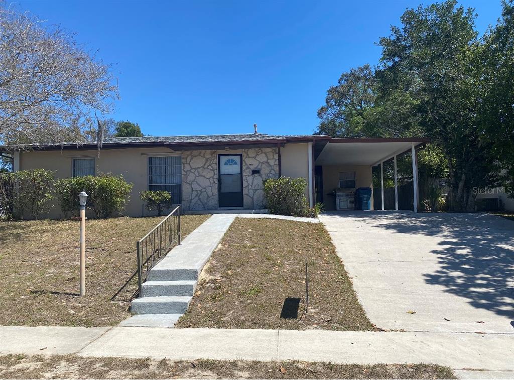 1050 Cobblestone Drive Spring Hill, FL 34606 - Photo 1 of 1 front view of a house