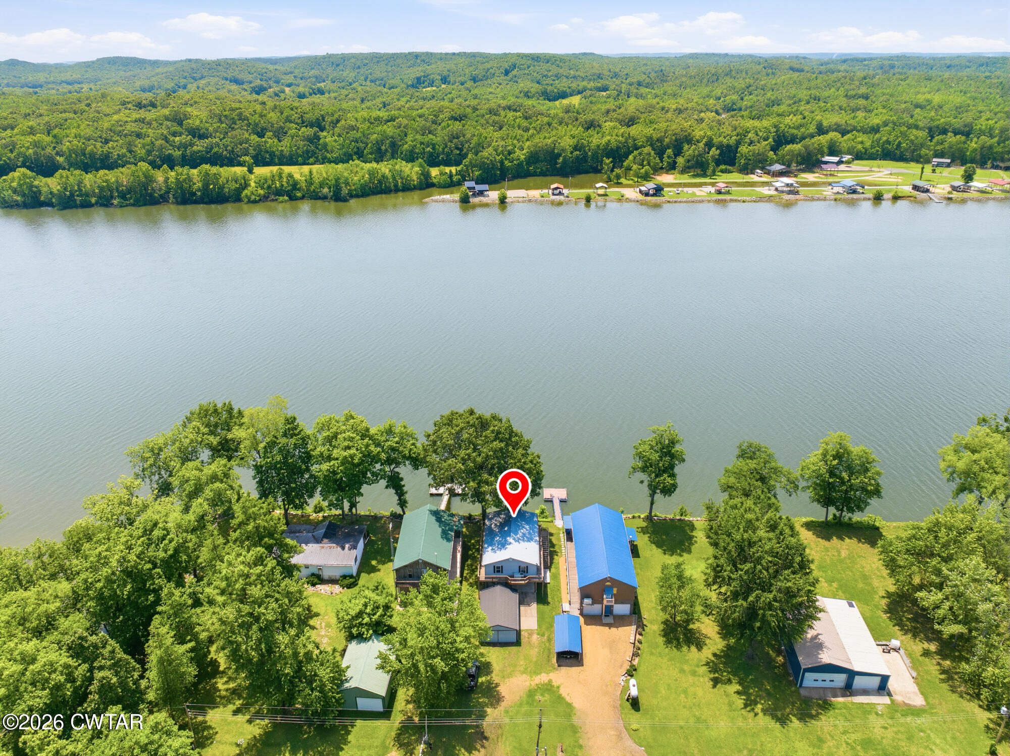 1728 Yarbro Landing Lane Decaturville, TN 38329 - Photo 20 of 44 an aerial view of lake and residential houses with outdoor space