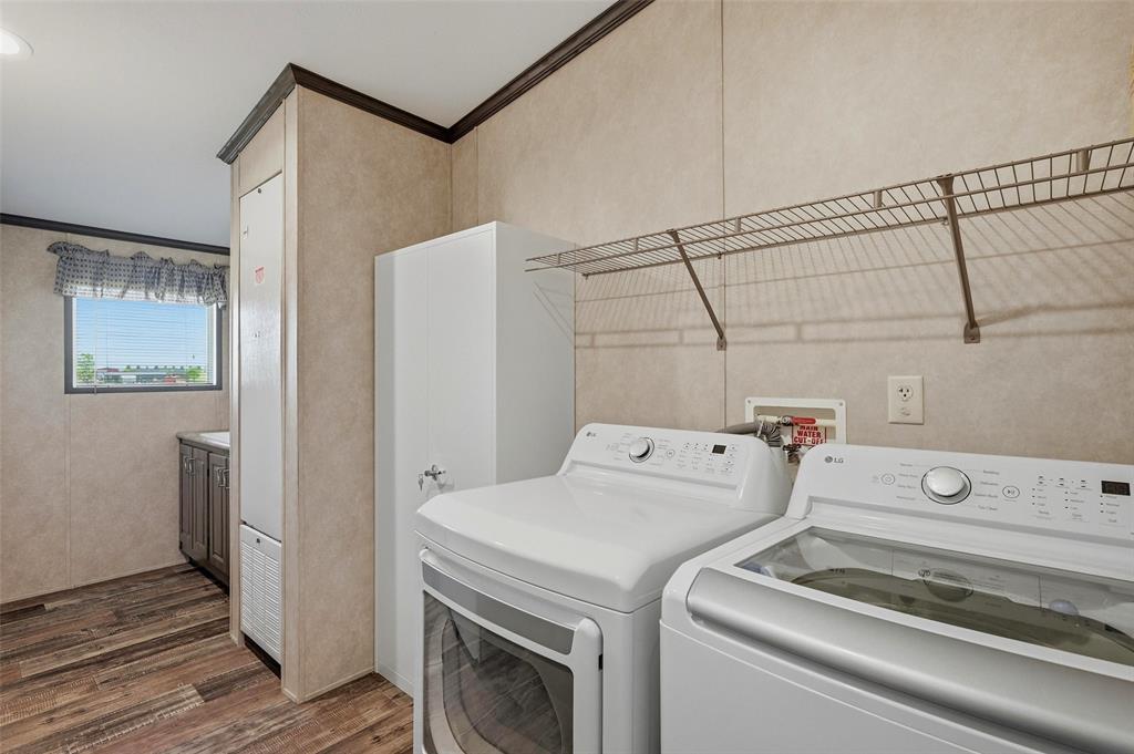 1113 Caroline Court Howe, TX 75459 - Photo 12 of 32 a utility room with dryer and washer