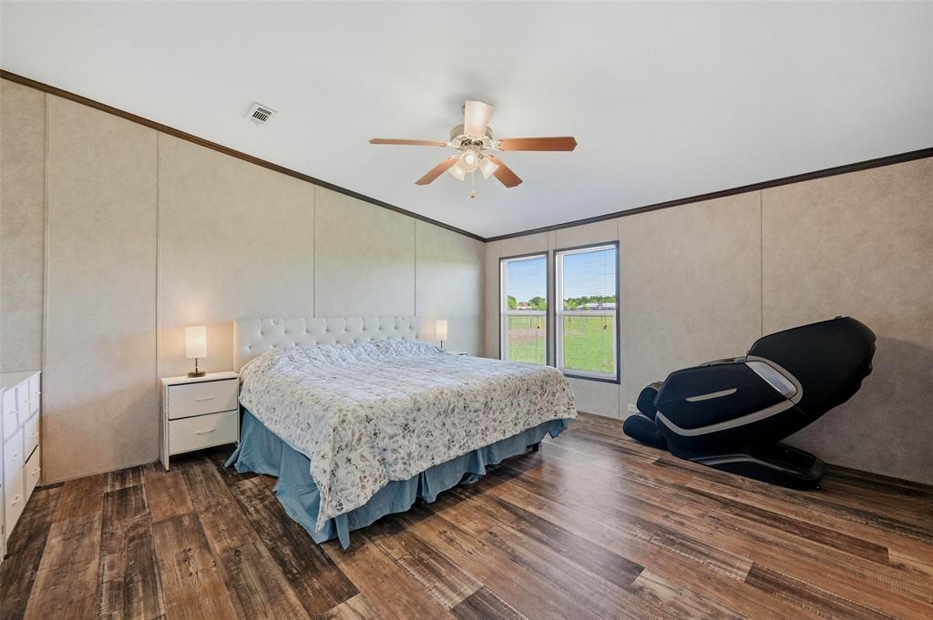 1113 Caroline Court Howe, TX 75459 - Photo 14 of 32 a bedroom with a bed and window