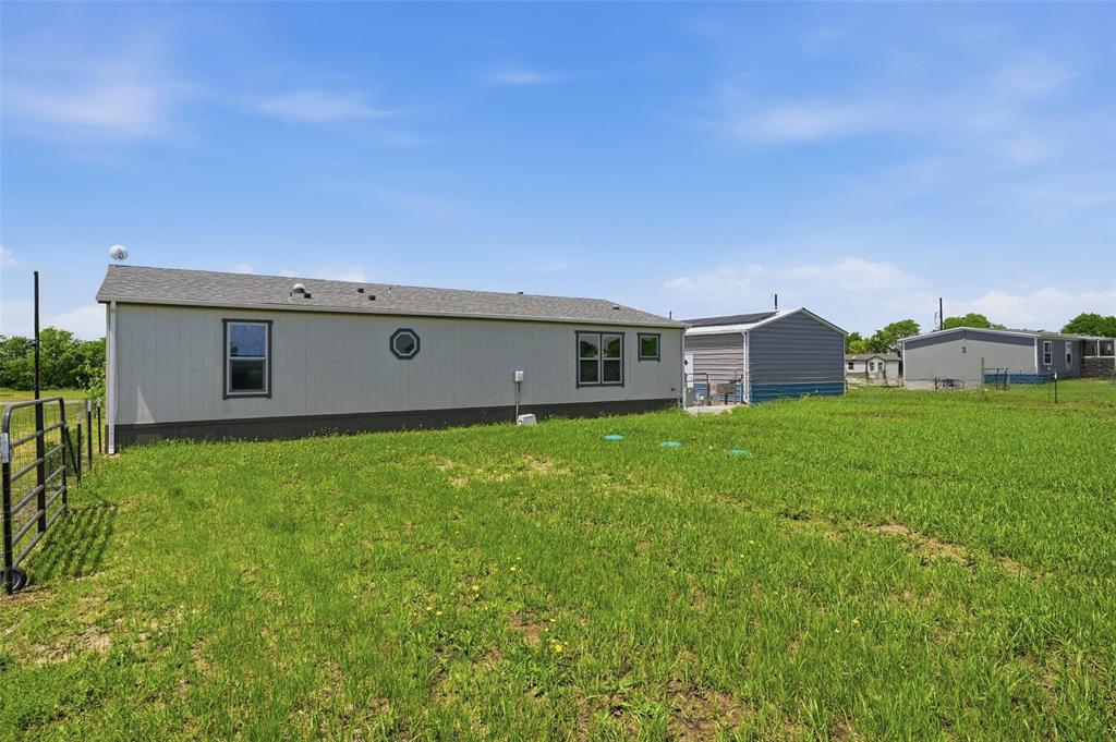 1113 Caroline Court Howe, TX 75459 - Photo 26 of 32 a view of a house with backyard