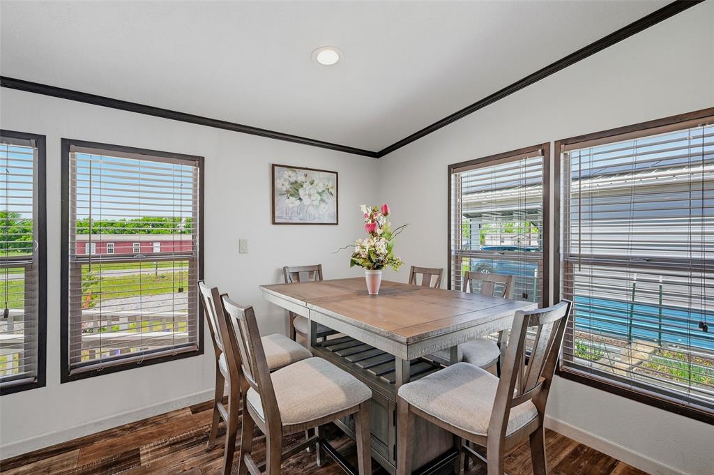 1113 Caroline Court Howe, TX 75459 - Photo 10 of 32 a view of a dining room with furniture window and outside view